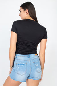 Blusa con frunces laterales