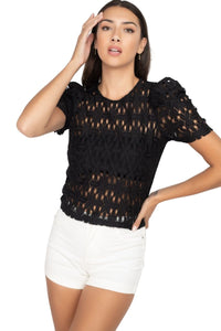 Blusa con transparencias y manga plisada