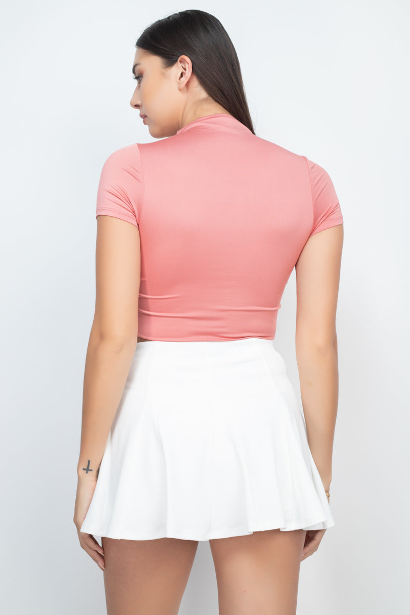 Blusa corta con cuello camisero